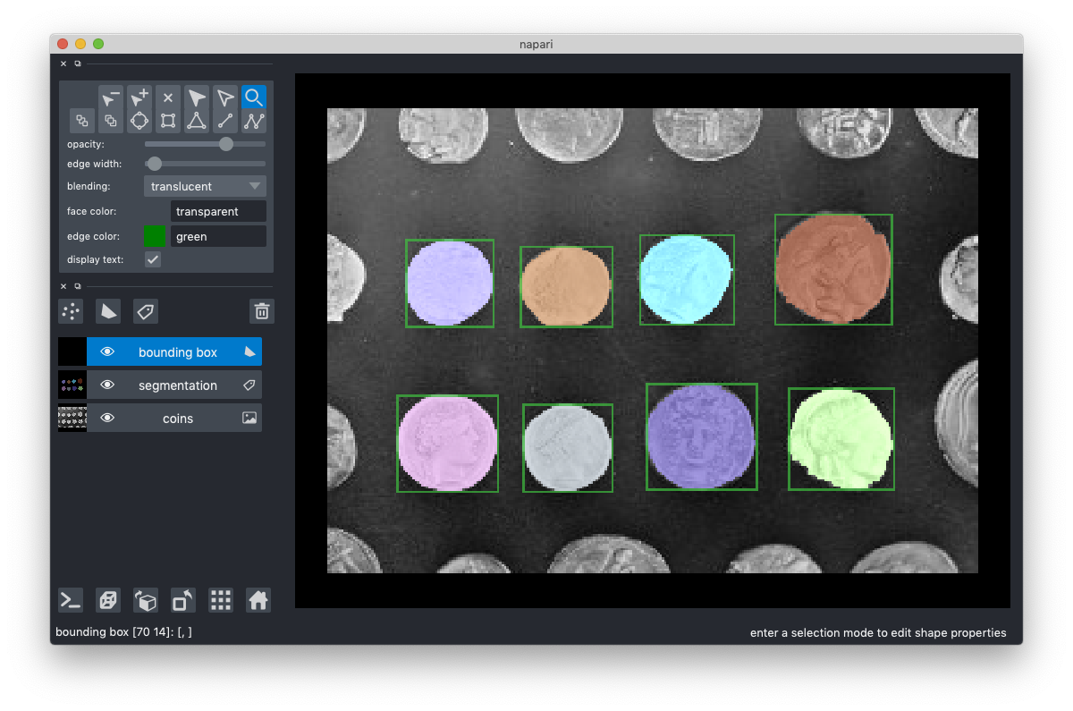 napari viewer showing eight roughly circular shapes, each colored differently. Each shape has a bounding box automatically generated around it.