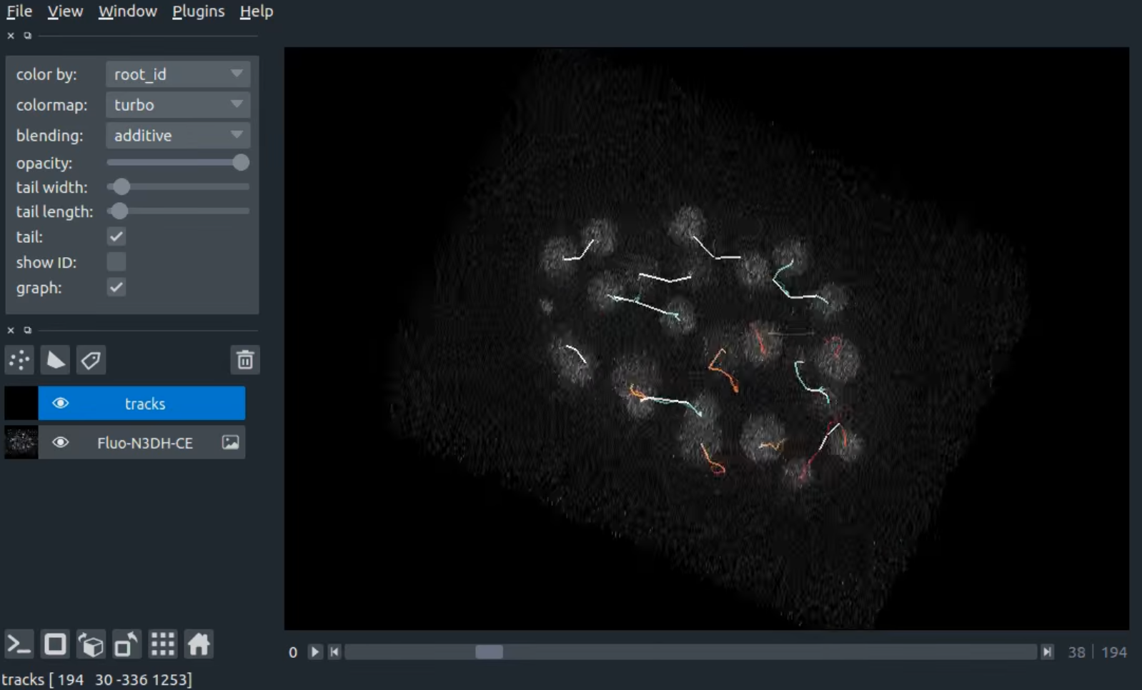 napari viewer with fluorescence imaging cells image layer and tracks layer loaded. The dimension slider under the canvas is at 0.